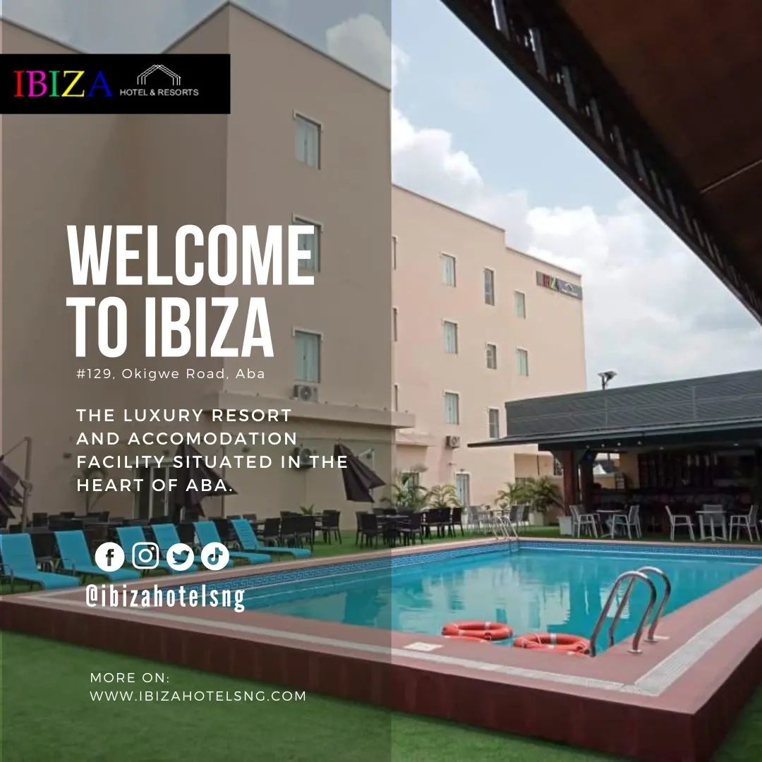 A beautiful multiple rooms and suite hotel named Ibiza with an off white color of about five floors